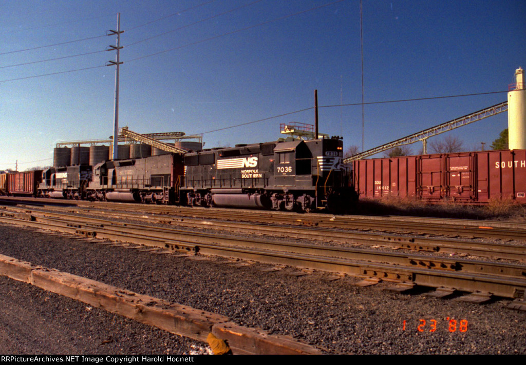 NS 7036 leads a northbound train thru the yard